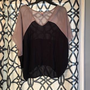 Bat-winged blouse